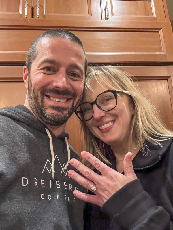 Ryan and Karin showing off the engagement ring